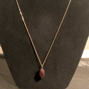 Gold necklace with brown glass bead